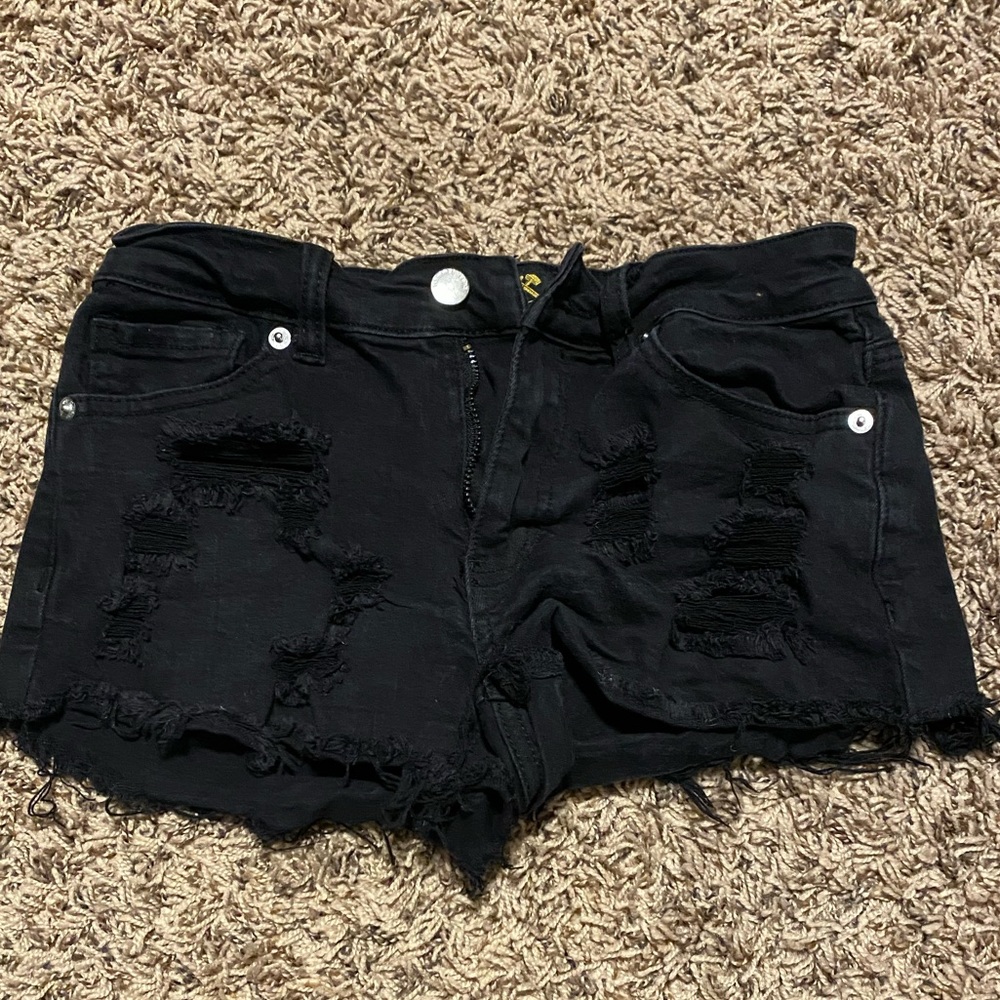 Black distressed shorts